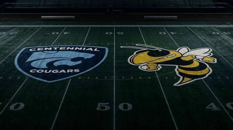 The Centennial Cougars and Fairview Yellow Jackets logos painted at midfield on the Fairview High School football field.
