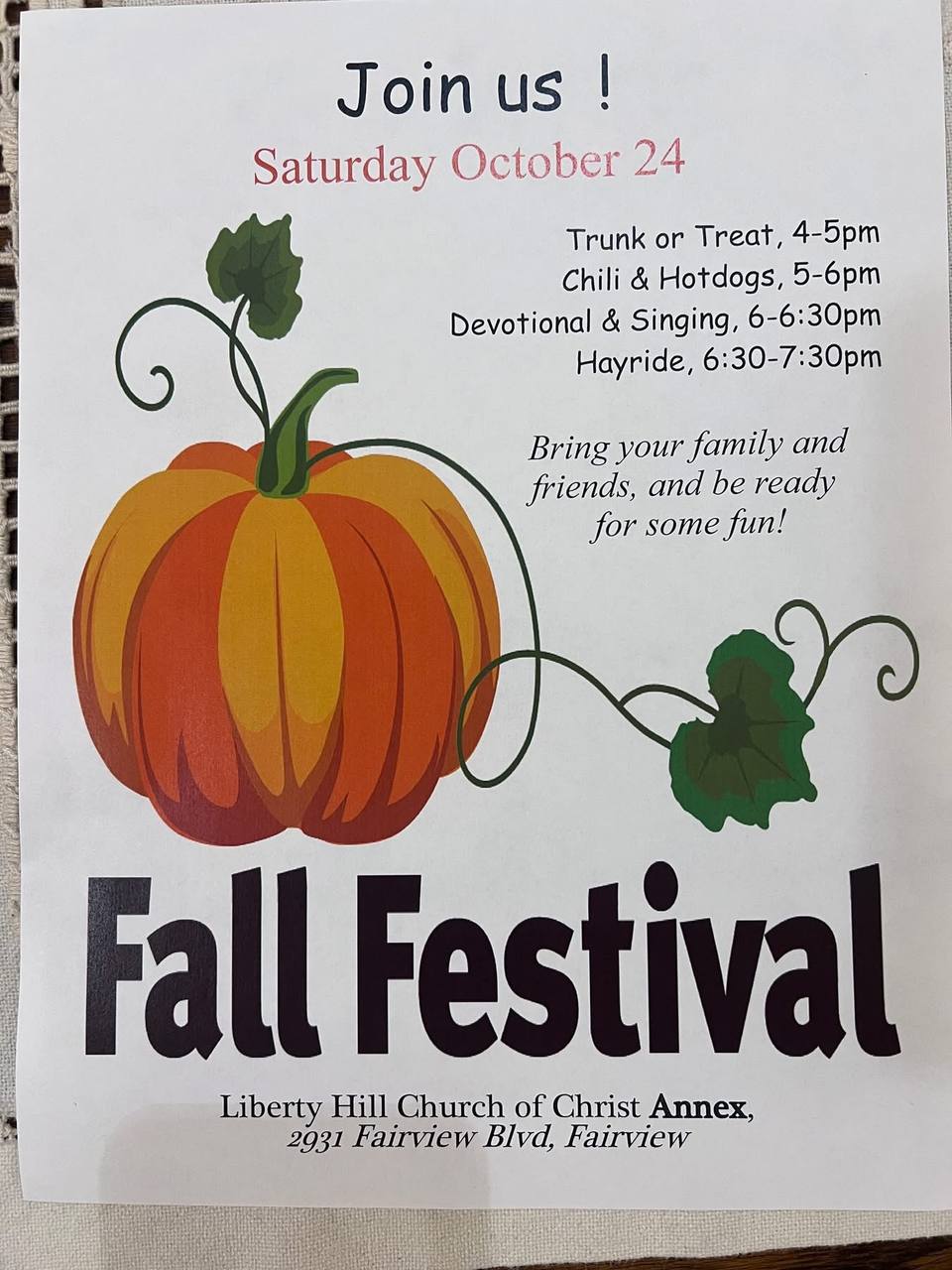 A flyer for a Fall Festival at the Liberty Hill Church of Christ Annex, with a large orange pumpkin on a curling green vine and a schedule of the evening.